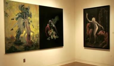 Corner display of paintings by James Jean
